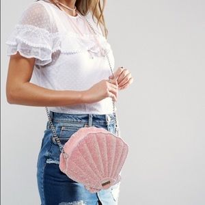 Like NEW Skinny Dip rose gold seashell purse!